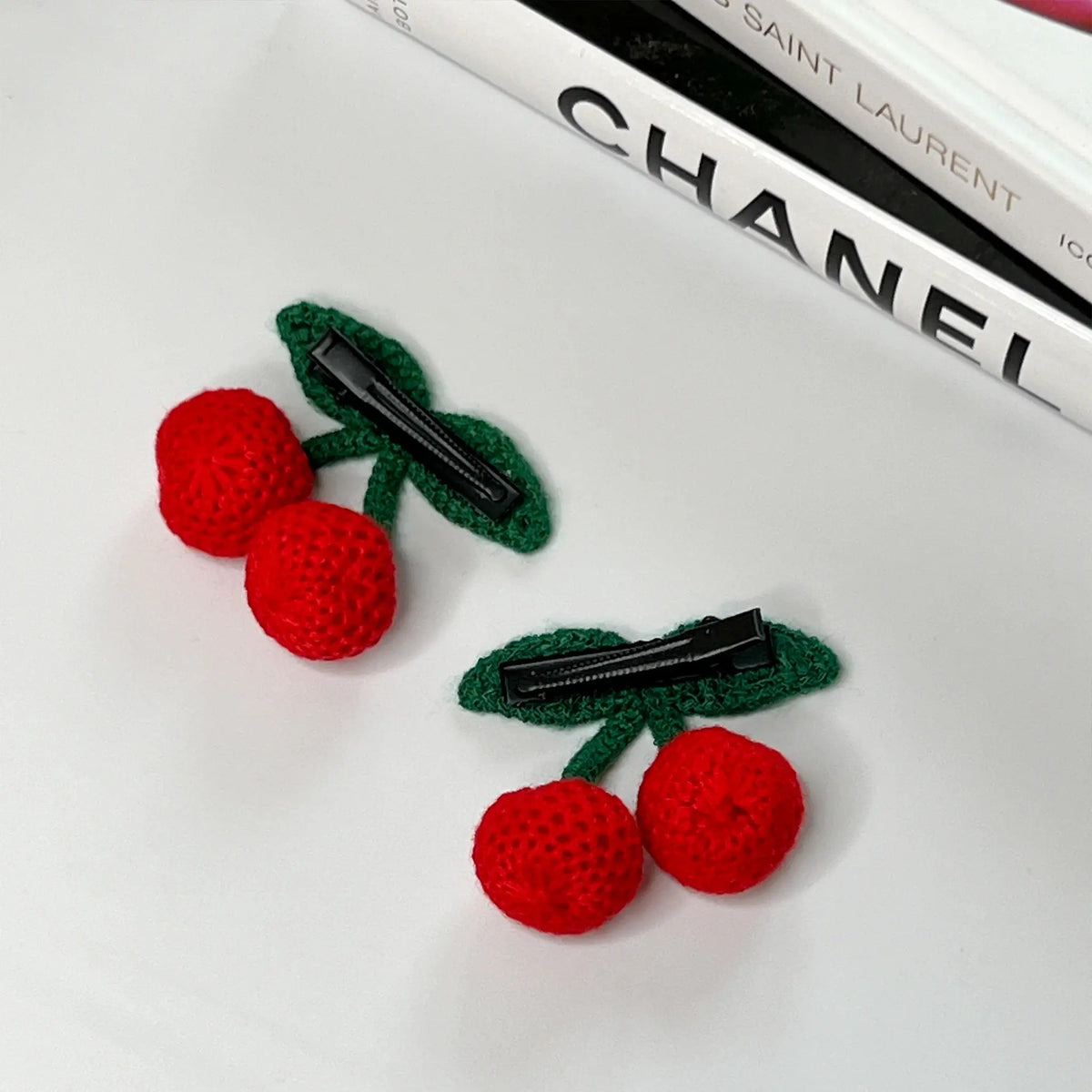 Sweet crochet cherry hair accessories, perfect for a playful and vibrant style
