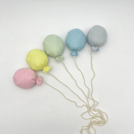 Colorful felt balloon perfect for playful photography