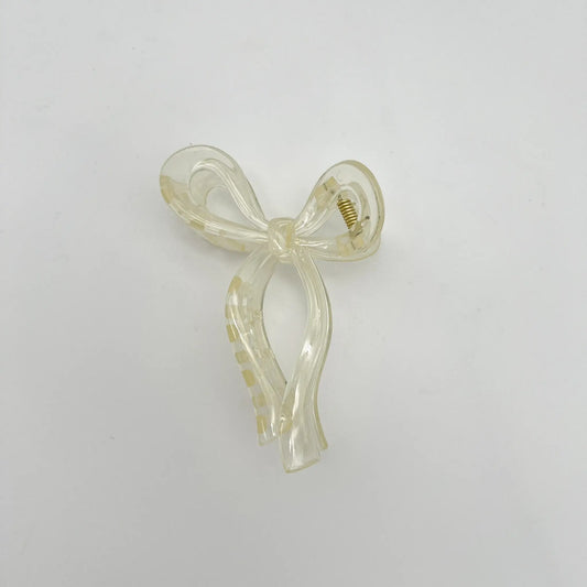 Versatile beige bow clip complements any outfit