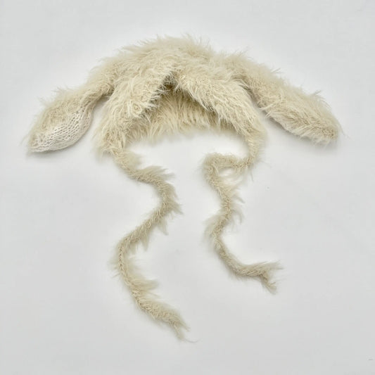 Beige bunny ear hat adds cuteness to baby outfits