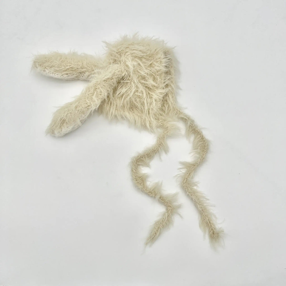 Soft and cozy beige baby hat with bunny ears