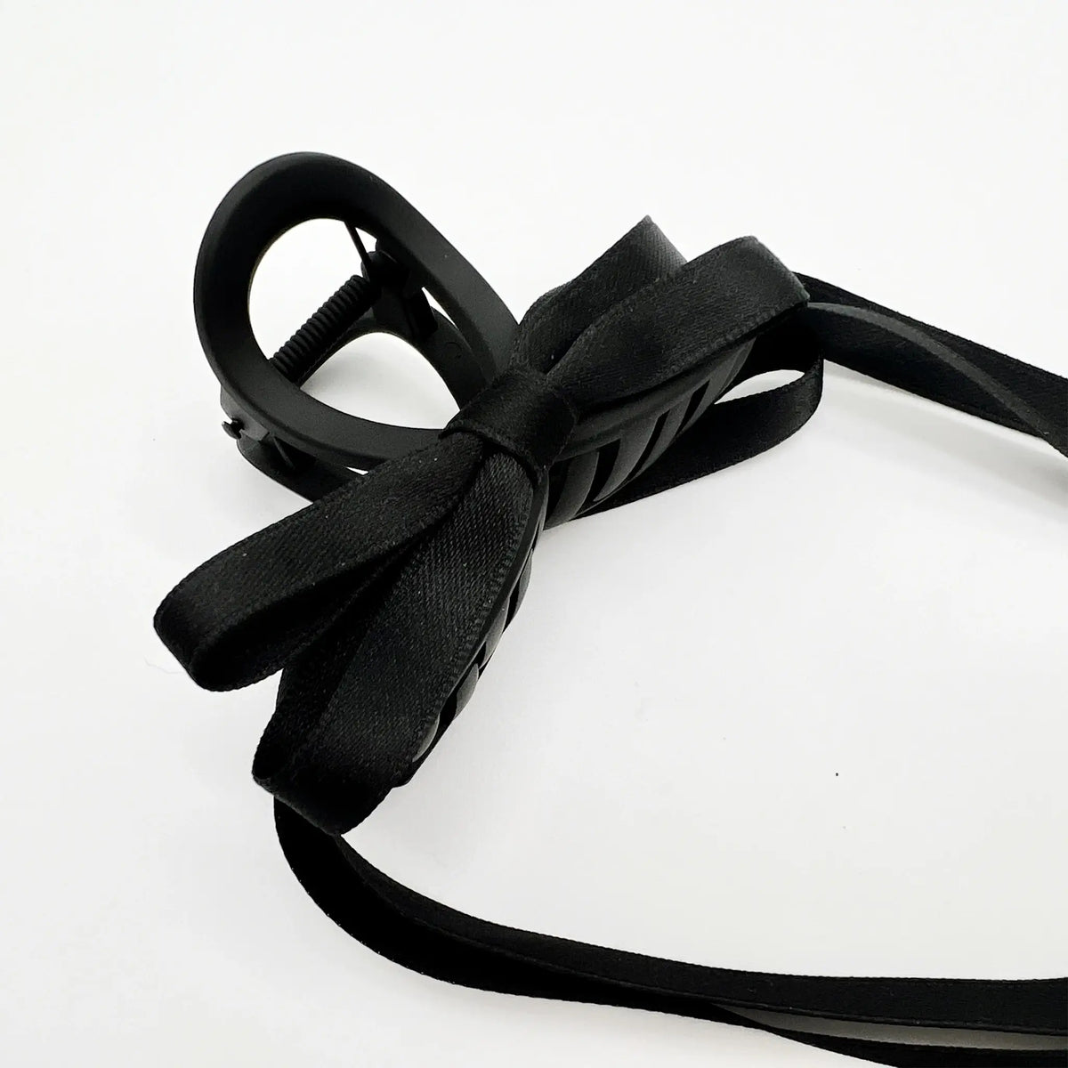 Graceful black ribbon bow hair clip for chic styling