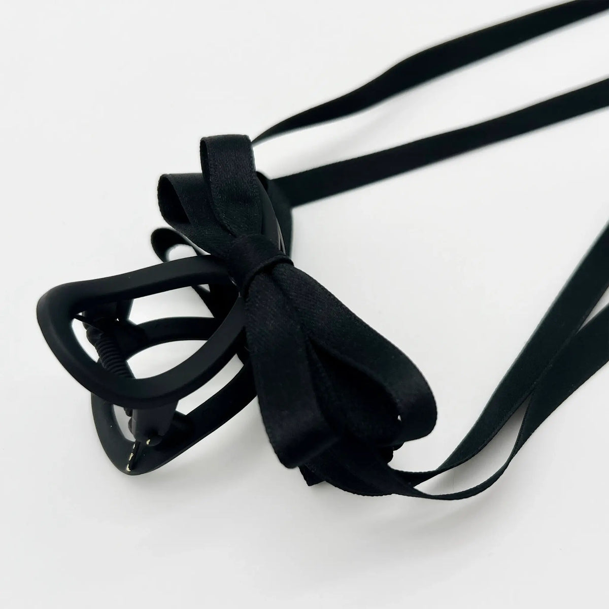 Black ribbon hair claw with elegant French flair