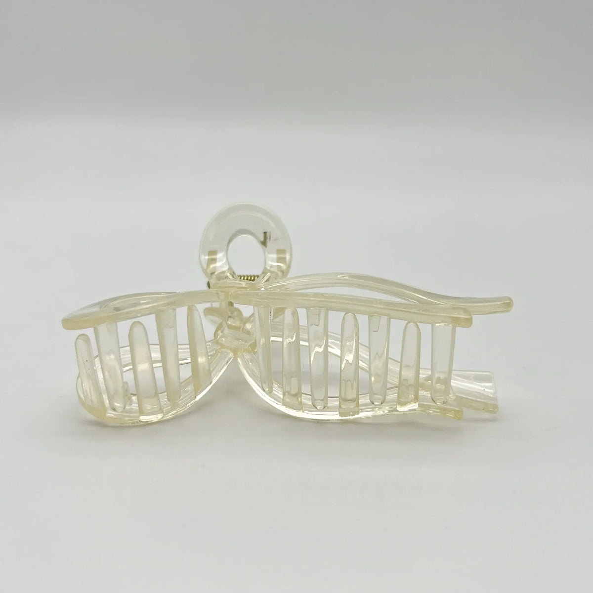 Unique beige bow clip for timeless charm