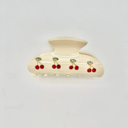 Elevate your hairstyle with our cherry hair claw clip