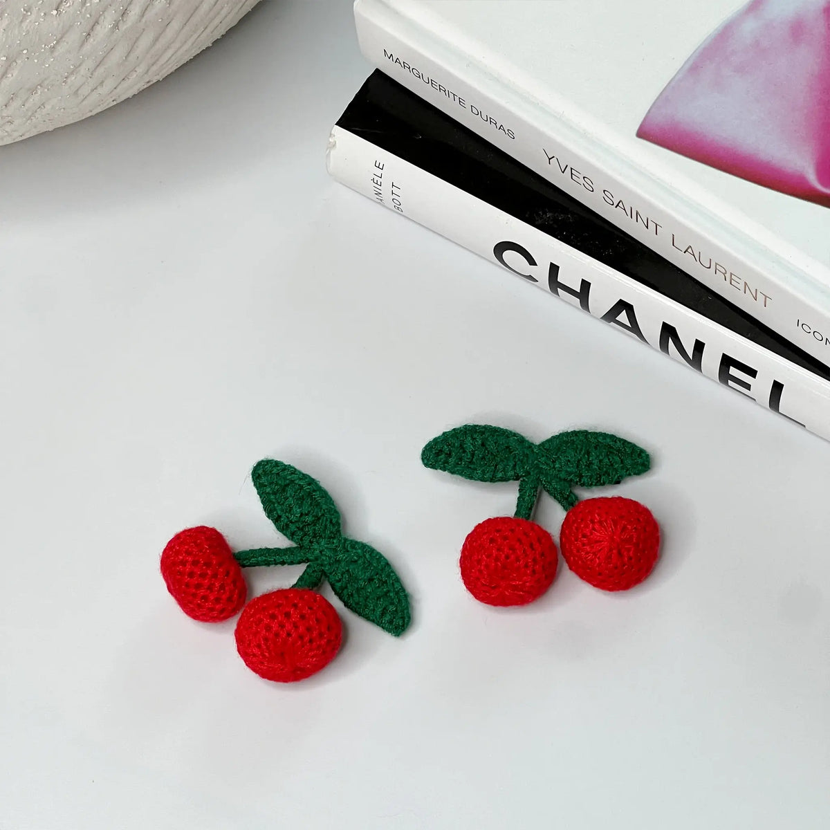 Handcrafted crochet cherry hair clips, ideal for a playful and cute hairstyle
