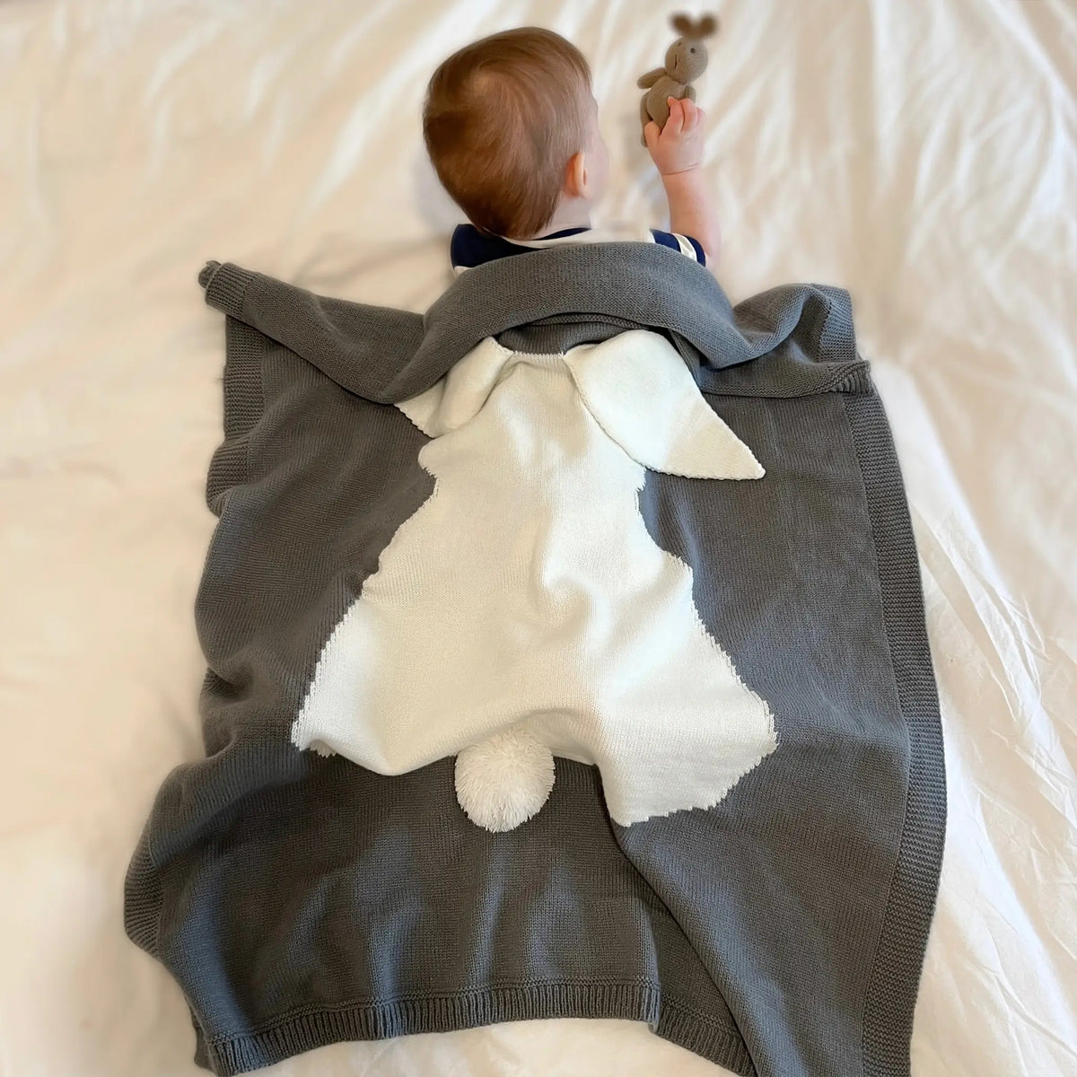 Adorable bunny-themed gray knit blanket for warmth and comfort