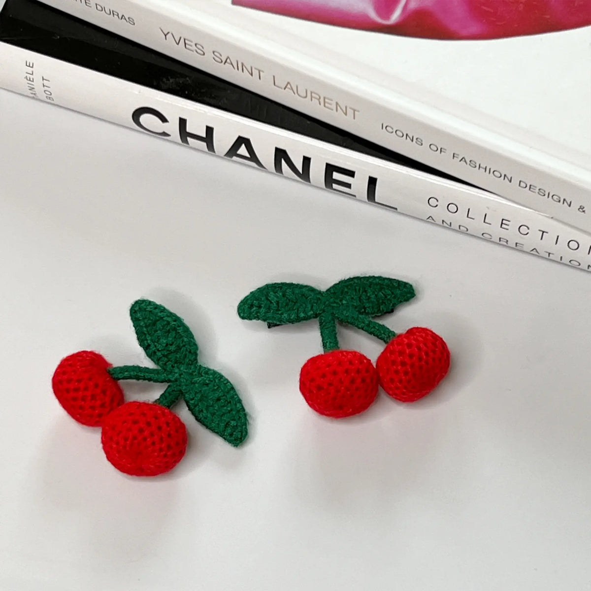 Crocheted cherry hair barrettes, adding a pop of fun to your hairdo