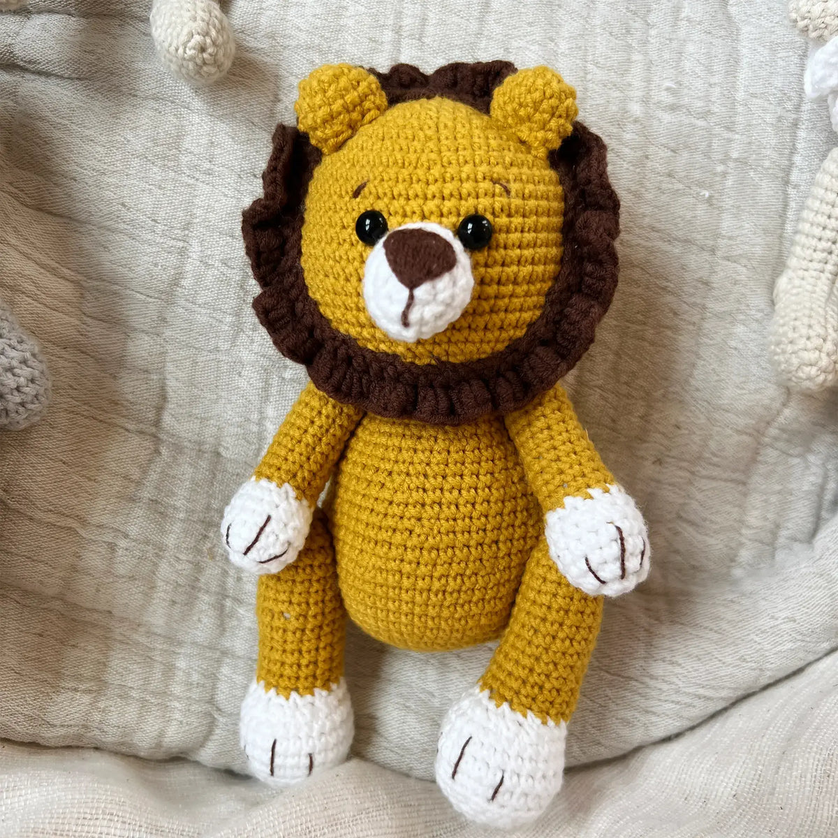 Crocheted lion toy with intricate detailing
