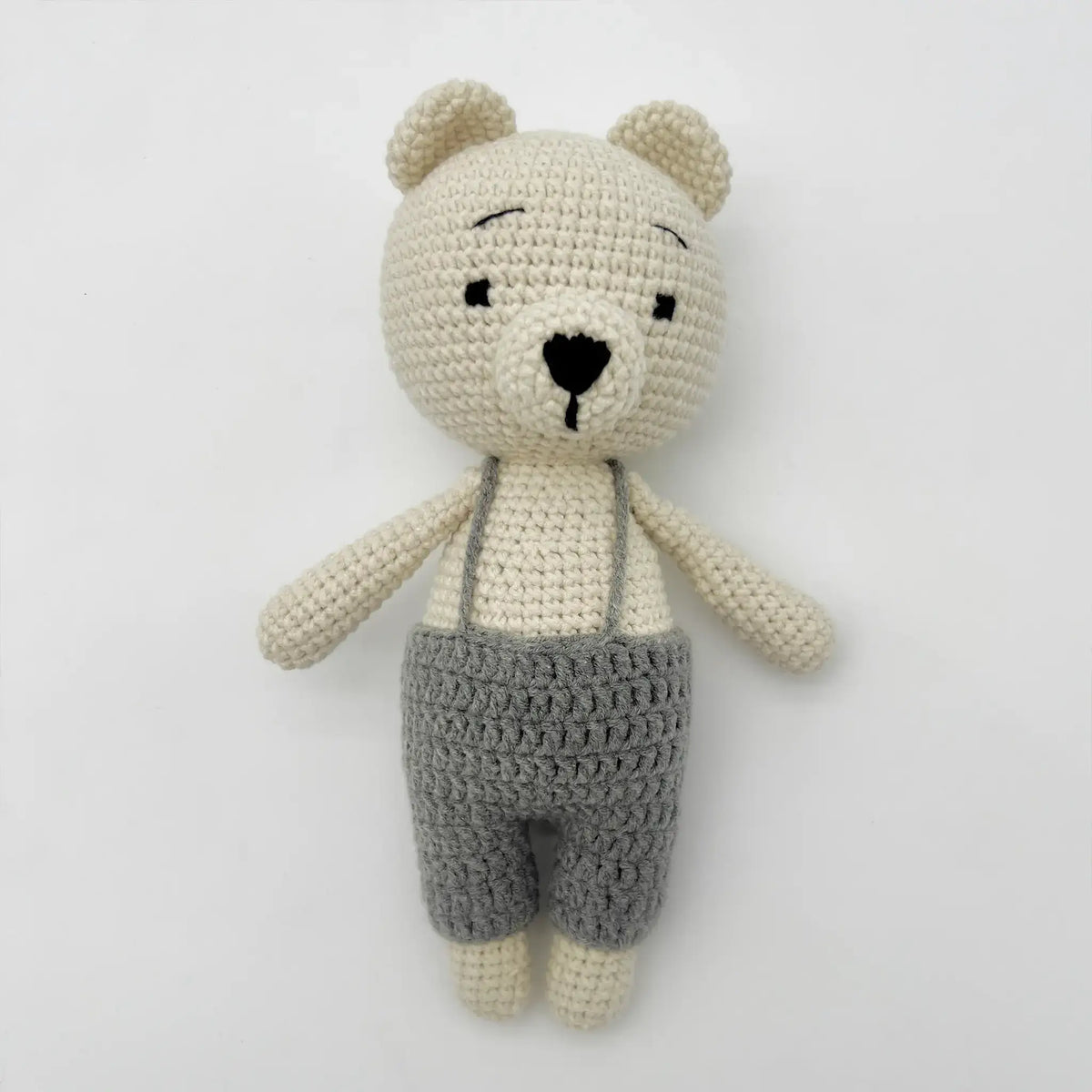 Handcrafted crochet teddy bear with fuzzy texture