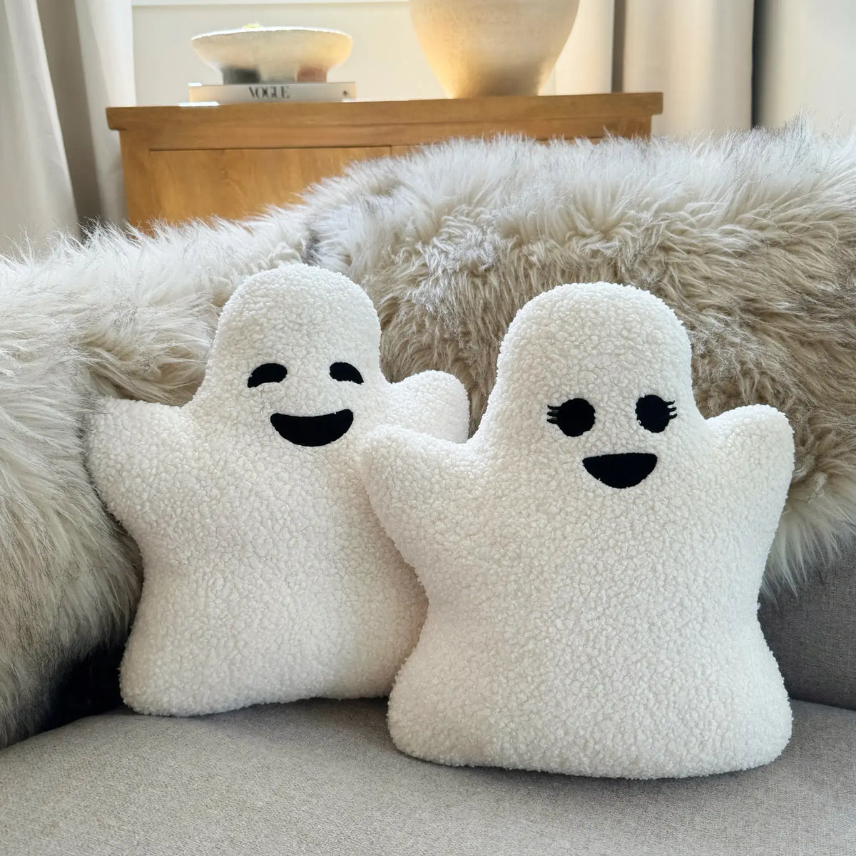 Girl and boy ghost pillow on couch
