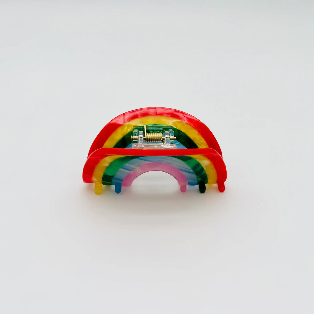 Vibrant rainbow hair clip adds a pop of color