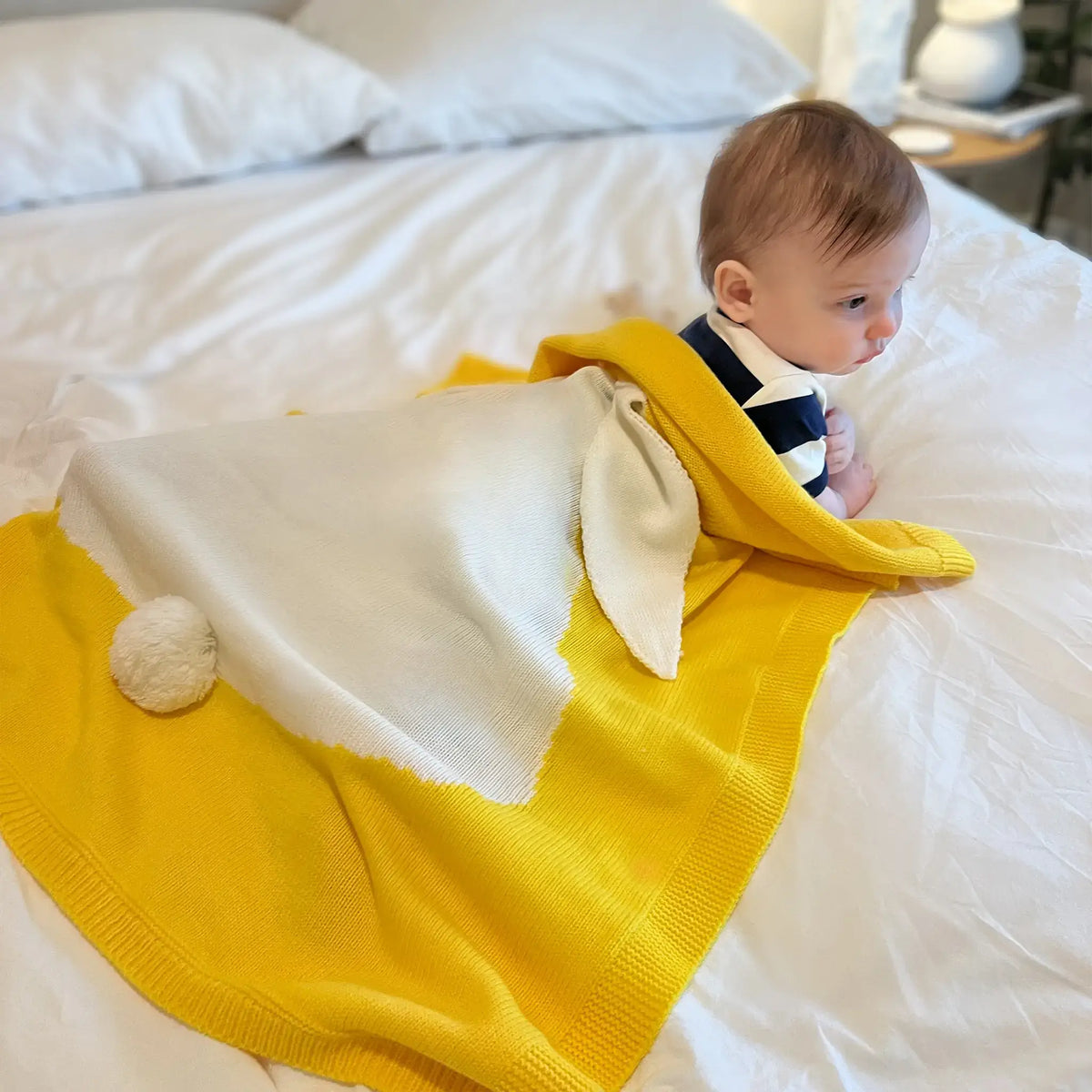 Stay warm and stylish with a yellow bunny knit blanket