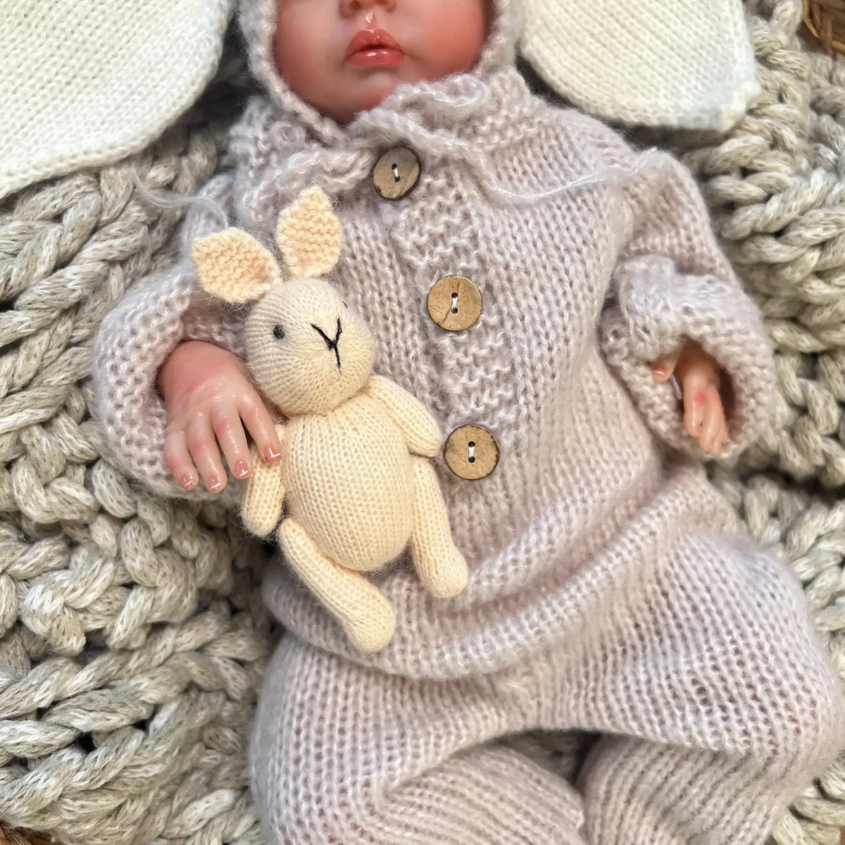 Irresistibly cute natural colored mohair bunny for cuddles