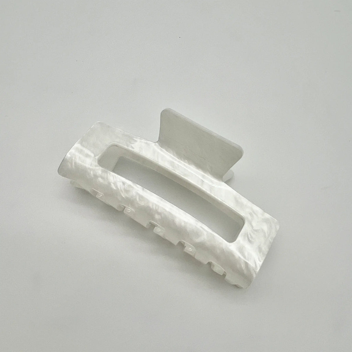 Timeless white hair claw clip for versatile looks