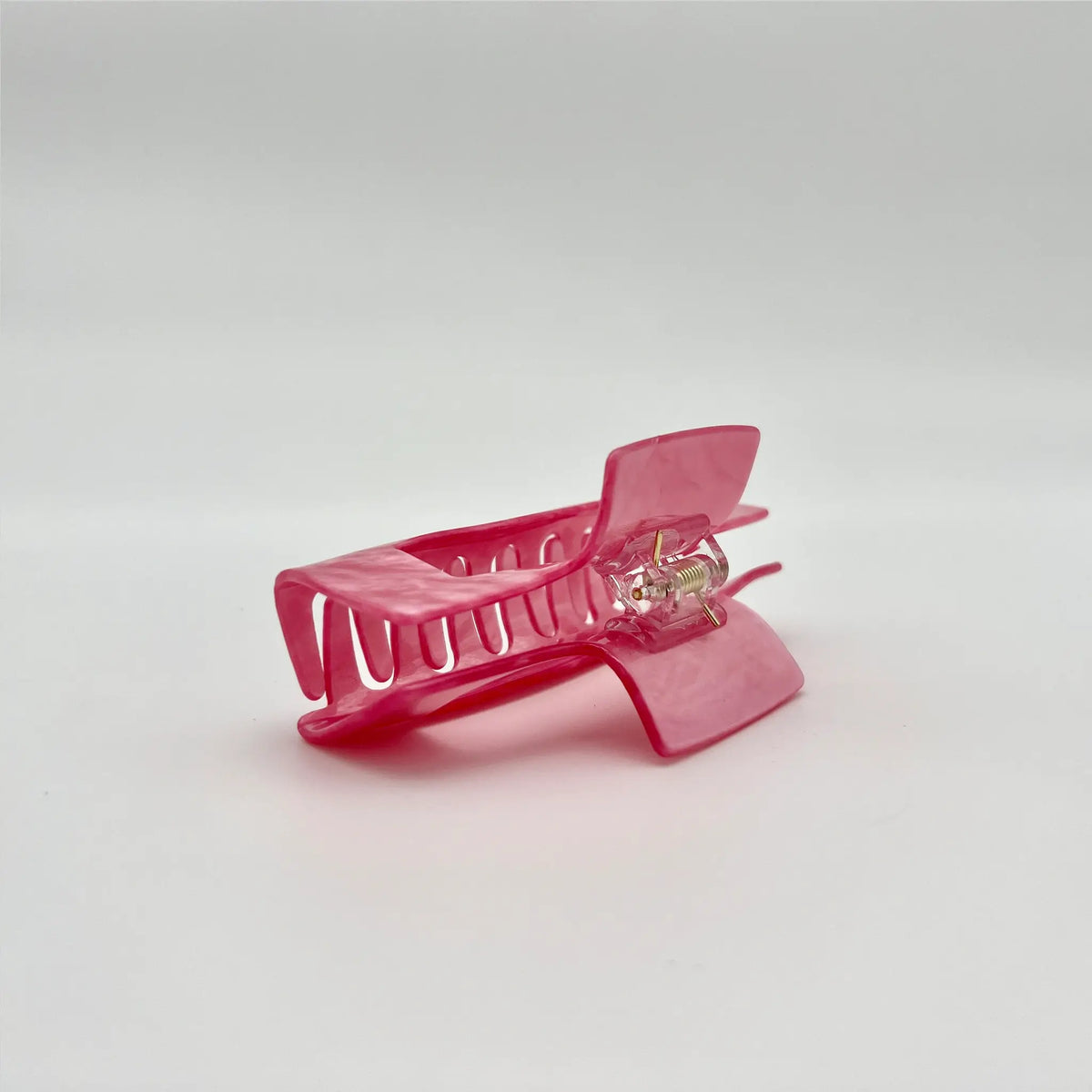 Sophisticated hair claw clip in elegant pearly pink