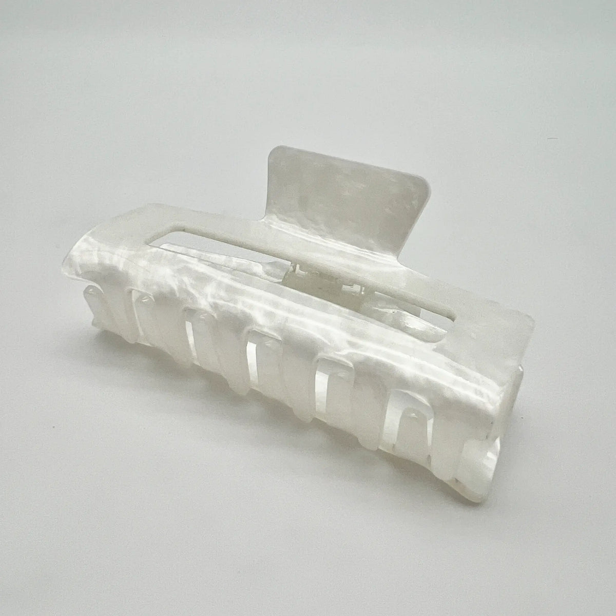 Elegant pearly white hair claw clip for chic styling