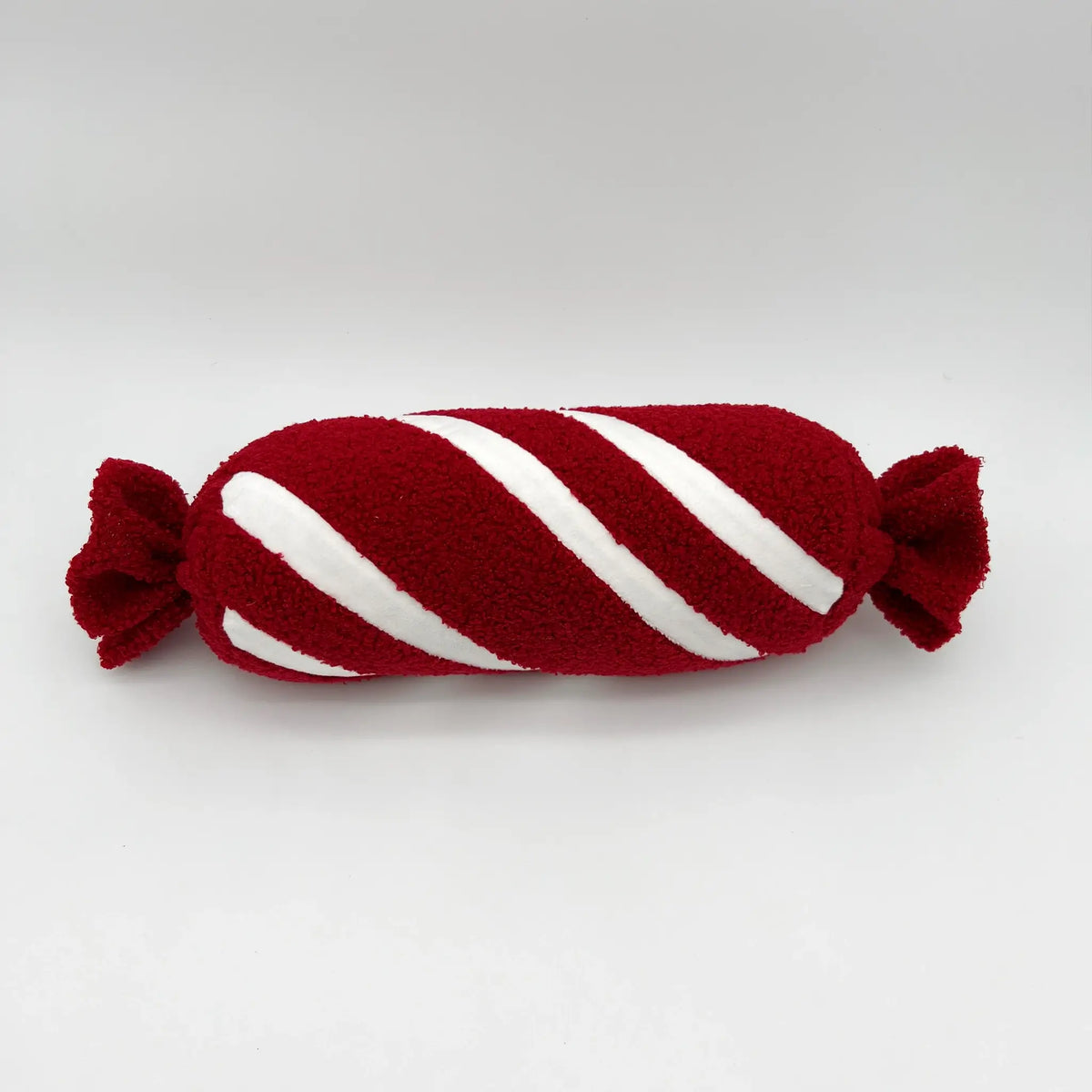 Peppermint twist Christmas pillow for cozy seasonal accents
