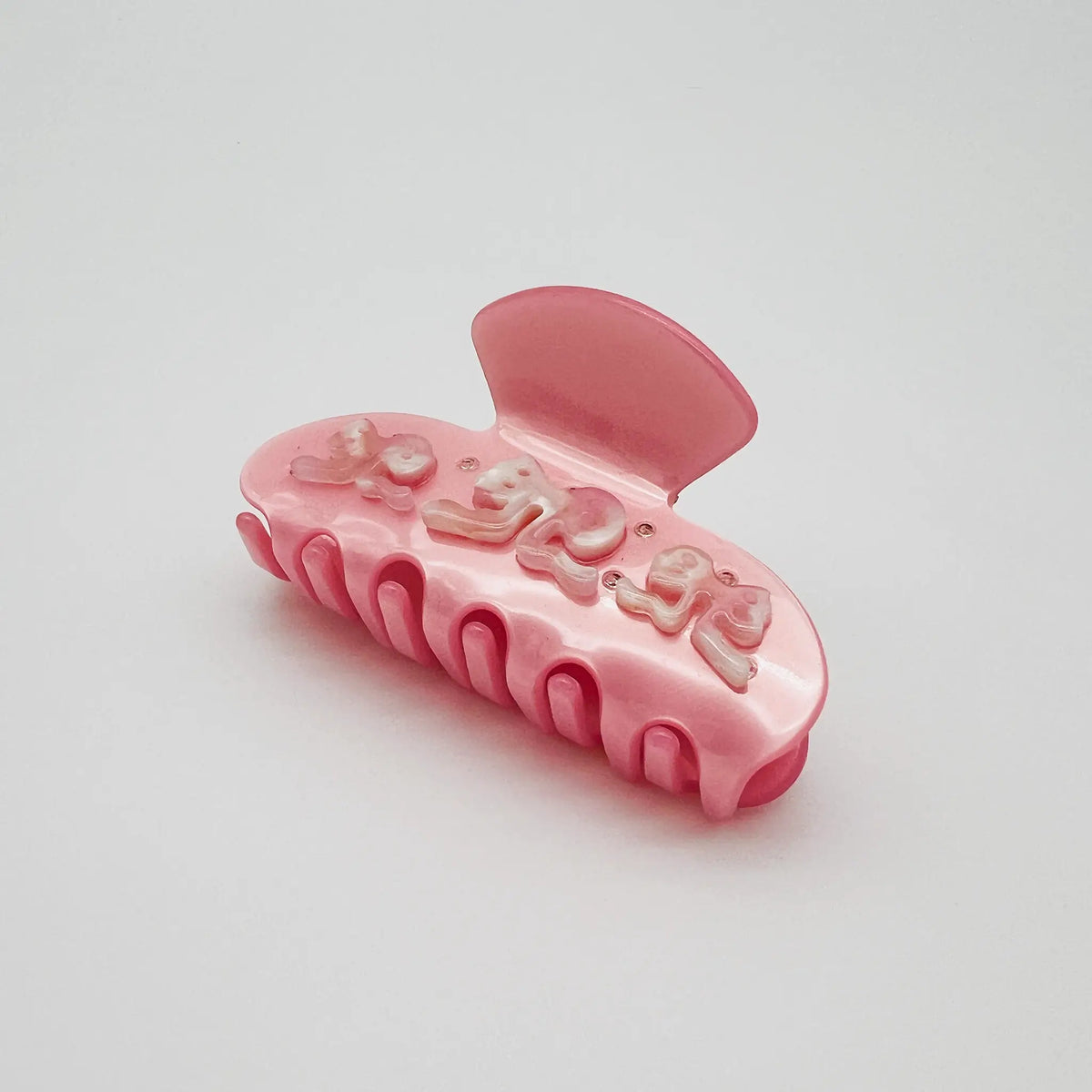 Charming hair claw clip with a lovely pink bows