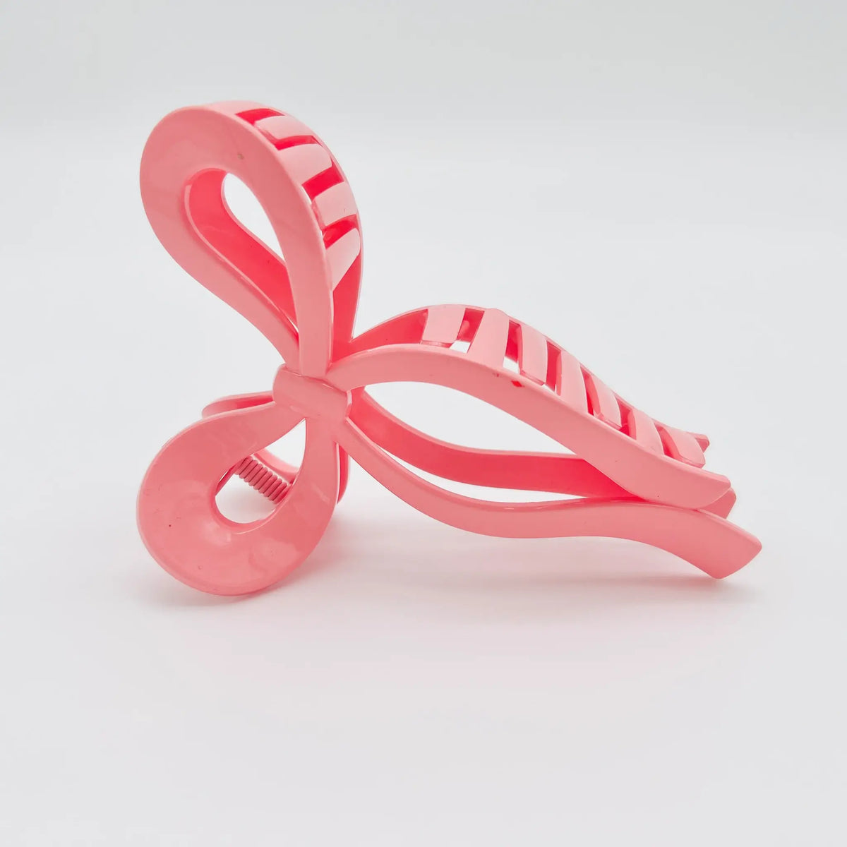 Accessorize with our stylish pink bow hair clip
