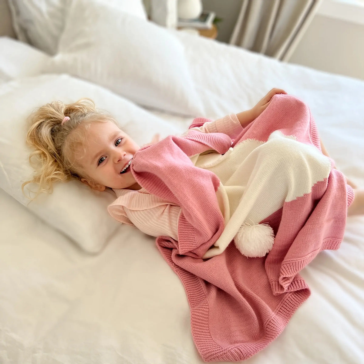 Wrap yourself in comfort with our pink knit bunny blanket