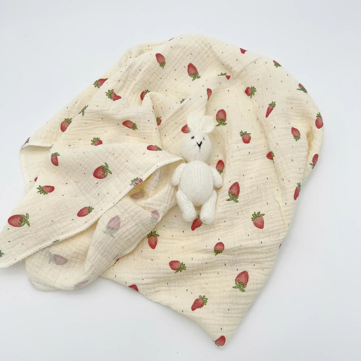 Adorable strawberry patterned muslin swaddle for baby