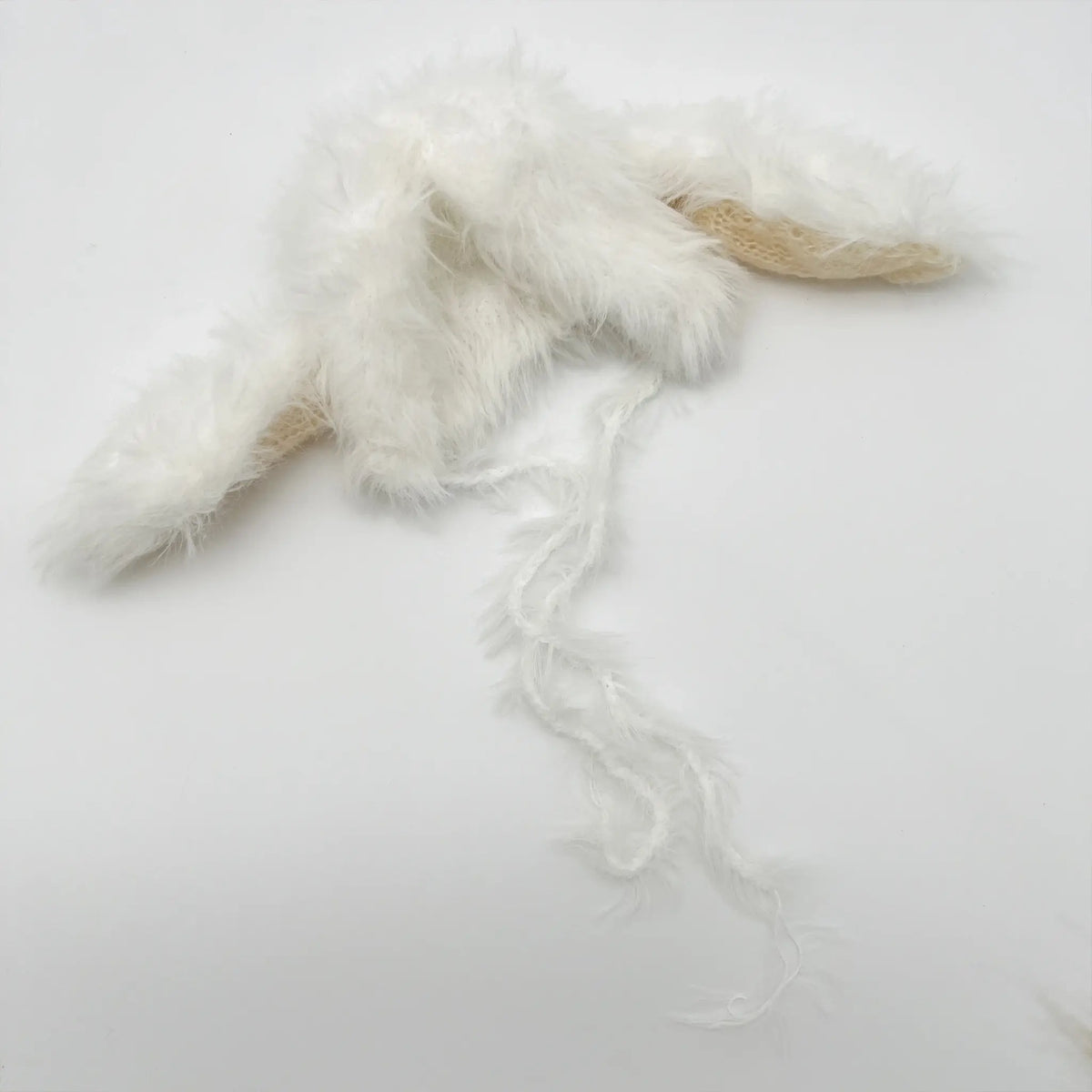 Adorable baby hat with white bunny ears, ideal for Easter outings