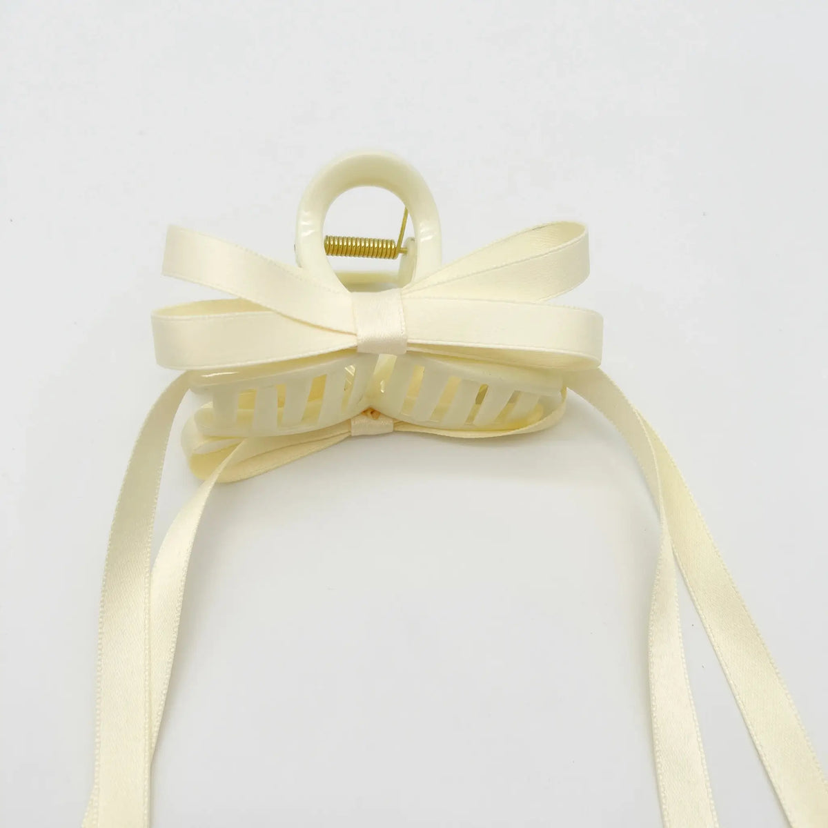 White ribbon hair claw with French bow design